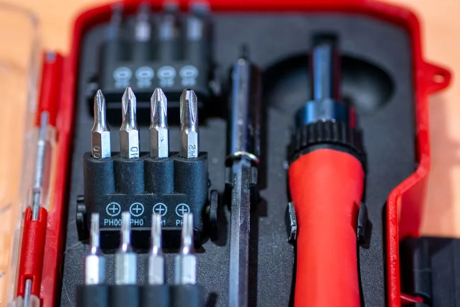 Small precision screwdriver bit set used for opening key fob cases